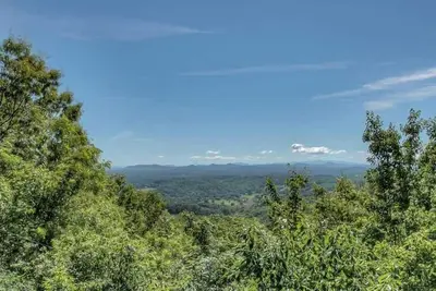Image de Grand View - Mountain View | Hot tub | Shuffleboard | Air Hockey | Screened in porch