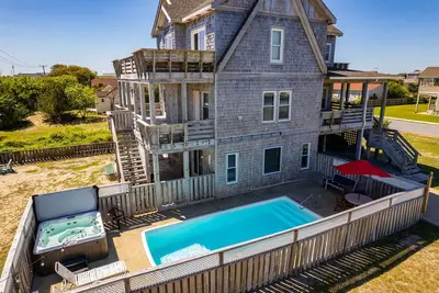 Image de 5 minute walk to ocean with opt heated pool, hot tub, game rm & tons of amenities