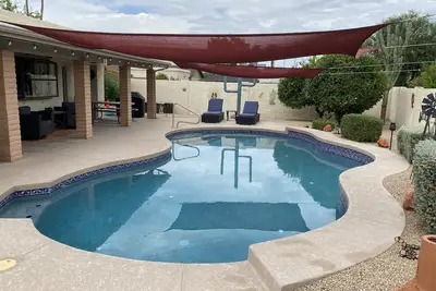 Image de Gorgeous corner lot home with a private pool and hot tub.