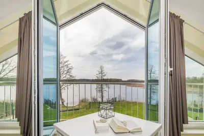 Image de Luxury lake domicile with sauna, fireplace and boat - 130m²