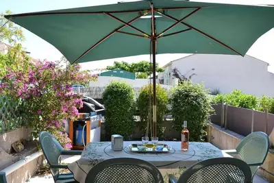 Image de Maison familiale climatisée, 6 couchages, proche plage et centre, terrasse, parking privé