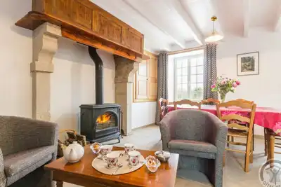 Image de Maison cosy cotentine avec terrasse, jardin, poêle à bois et équipements modernes