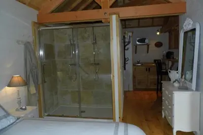 Image de Cabane Jacuzzi Vue sur la campagne à La Cabane de Domenge