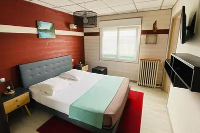 Image de chambre double confort avec duche