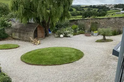 Contemporary cottage nestled in valley with beautiful views.