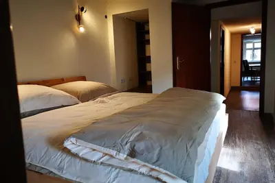 Image de Ferienwohnungen am FlĂĽsterbogen - Maisonette apartment