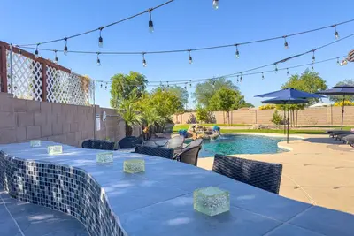 Image de Resort Style Backyard w/ Heated Pool