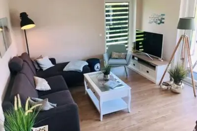 Image de Möwennest N°4 - Ground floor apartment with sauna, sun terrace and garden.