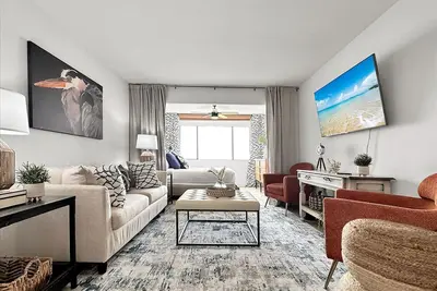 Image de Cozy coastal condo with water view, pool, central A/C, & easy beach access
