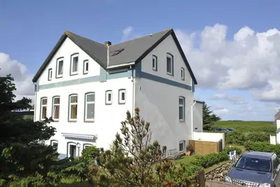 Image de Vacation apartment with approx. 80 m², 4 rooms and sea view for up to 4 people
