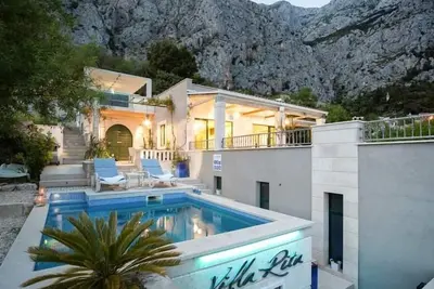 Image de Maison de vacances Makarska pour 1 - 4 personnes avec 2 chambres à coucher - Ferme