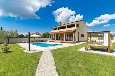 Image de Maison de vacances Juršići pour 1 - 8 personnes avec 3 chambres à coucher - Maison de vacances