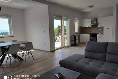 Image de Apartments in Lopar (island Rab) near sandy beach, sea view, quiet location, garden, parking lot.