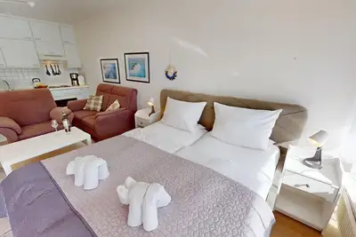 Image de 1-room vacation apartment for 2 people and dog with terrace and underground parking space