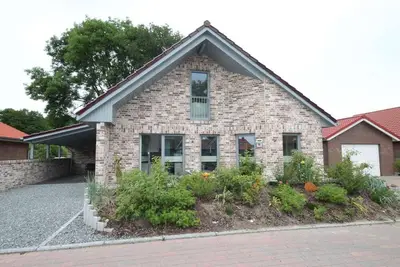 Image de Vacation home near the beach for 6 people and dog with fireplace & garden in a quiet location.