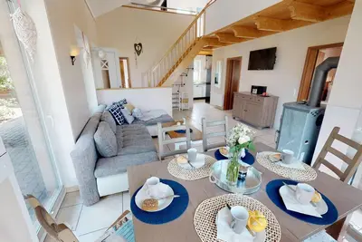 Image de Spacious 8-person vacation home with sauna, fireplace and garden near the beach