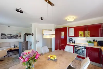 Modern vacation apartment for 6 guests close to the beach with terrace, fireplace and sauna