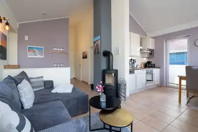 Image de Vacation home close to the beach for 4 people and dog with sauna, fireplace and fenced garden.