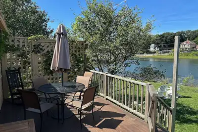 Image de River Watch: Waterfront home with river views and a private dock.
