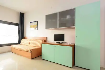 Image de Appartement de vacances avec balcon, air conditionné et internet