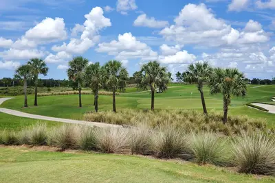 Image de Beautiful 2nd Floor Coach Home at Lakewood National with West Facing Lanai View