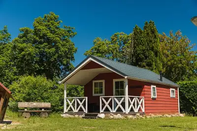 Image de Luxury glamping is done in this colorful Scandinavian lodge.
