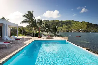 Oceanfront modern villa with view of Pinel island
