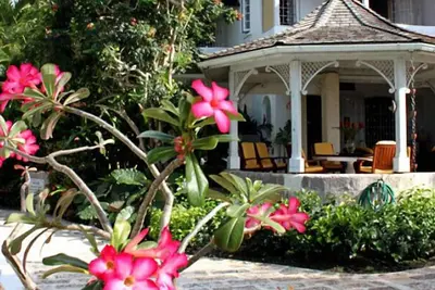 Emerald Beach 1 - Villa Solandra | Beach Front - Located in  Exquisite Gibbs Bay with Private Chef Services