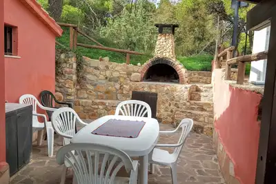 Image de Maison de vacances Porto Pino pour 1 - 4 personnes avec 2 chambres à coucher - Maison de vacances