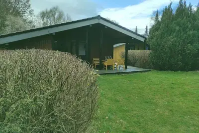 Image de Pure relaxation right next to the forest and only 750m to the beach in our retro chalet