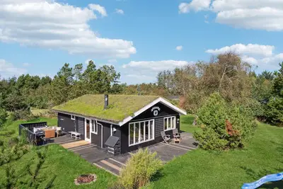 Image de Maison acceptant les animaux de compagnie à Blokhus avec sauna