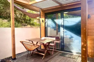 Image de Charme et tranquillité- lodge.