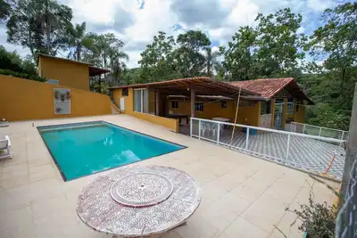 Image de Chácara c piscina, churrasqueira e Wi-Fi em Ibiúna