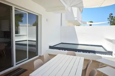 Image de Maison de vacances Porto Pino pour 1 - 4 personnes avec 2 chambres à coucher - Maison jumelée