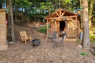 Off Grid Cabin nestled in the woods next to a stream at the base of Tug Hill
