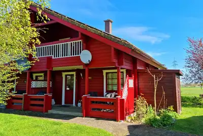 Image de Urlaubsbutze - Your vacation home at the Baltic Sea and Schlei - great/cozy log cabin