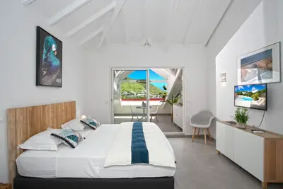 Image de Belle suite S12 vue mer avec piscine à Cul de sac, Wifi haut débit
