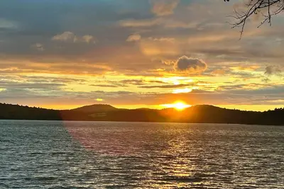 Image de Serene Sunsets at our Kamaniskeg Lake Home