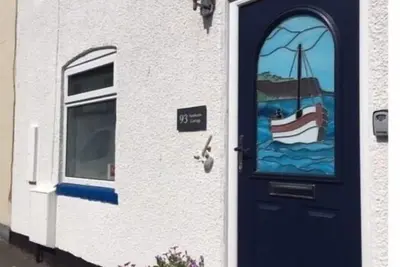 Image de Sunbeam Cottage - 3 bedroom traditional cottage - Straight off the beach