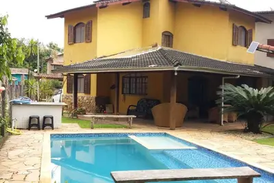 Image de Cozy beach house with beautiful green area and mountains in a gated community
