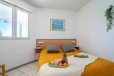 Image de Joli appartement pour 6 personnes avec piscine, Wifi, Tv, terrasse, animaux admis et parking