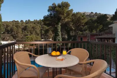 Image de Charmant appartement \"Pinos Altos T1\" avec piscine, Wi-Fi, balcon et terrasse