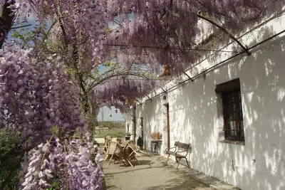 Image de Charming rural house with swimming pool 3 km from the city of Granada. parking