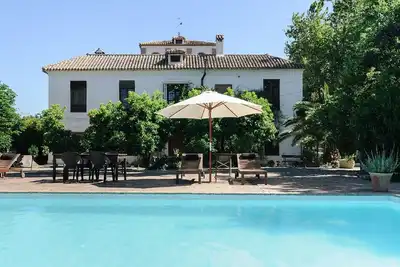 Image de Charming rural house with swimming pool 3 km from the city of Granada. parking