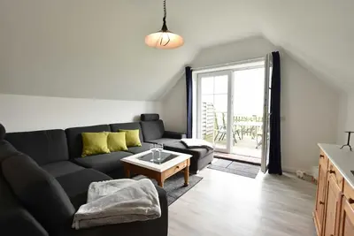 Image de App. 3 / 3-room (6 adults + infant), attic, with water view - Ferienwohnungen Zum
