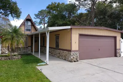 Image de Lake Front Country Pool Home, 40 minutes to Disney