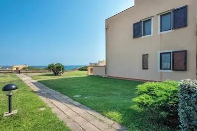 Maison de vacances \"Pergola 707\" à quelques mètres de la plage avec climatisation et terrasse privée