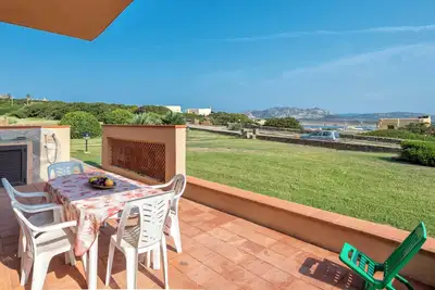 Maison de vacances \"Pergola 705\" à quelques mètres de la plage avec climatisation et terrasse privée