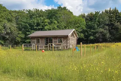 Beautiful traditional log cabin with commanding views across the Waveney Valley.