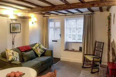 Image de The Snug is ideally situated in the centre of town within walking distance of all amenities.